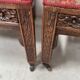 Pair of Gothic-style walnut lounge chairs, 19th century
