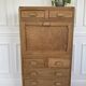 Vintage wooden secretary desk in the style of a professional piece of furniture