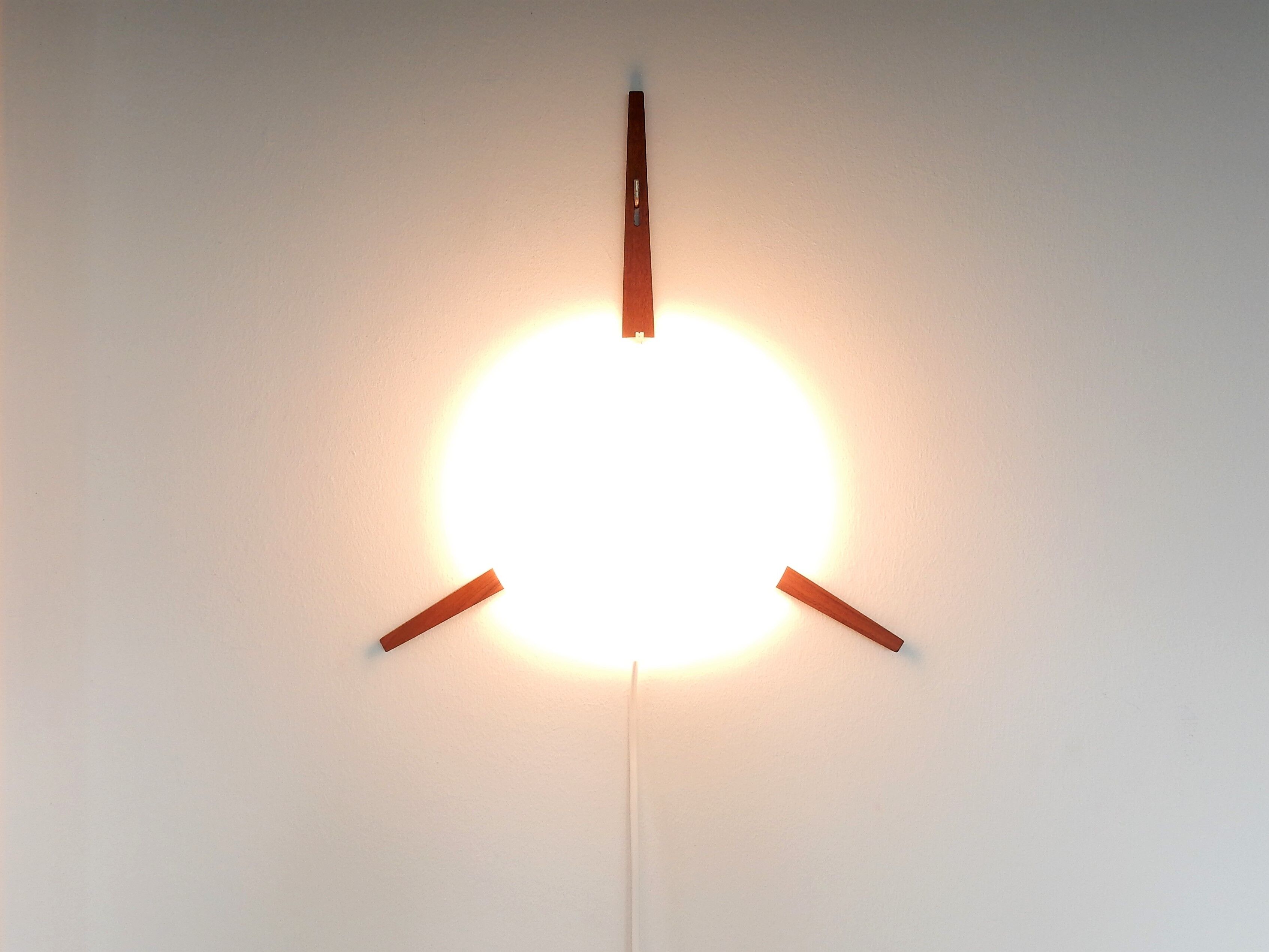 C-1575 teak and opaline glass wall lamp by Eje Ahlgren for Raak 1957