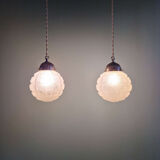 Art Deco trio of frosted glass pendants, 1920s-30s.