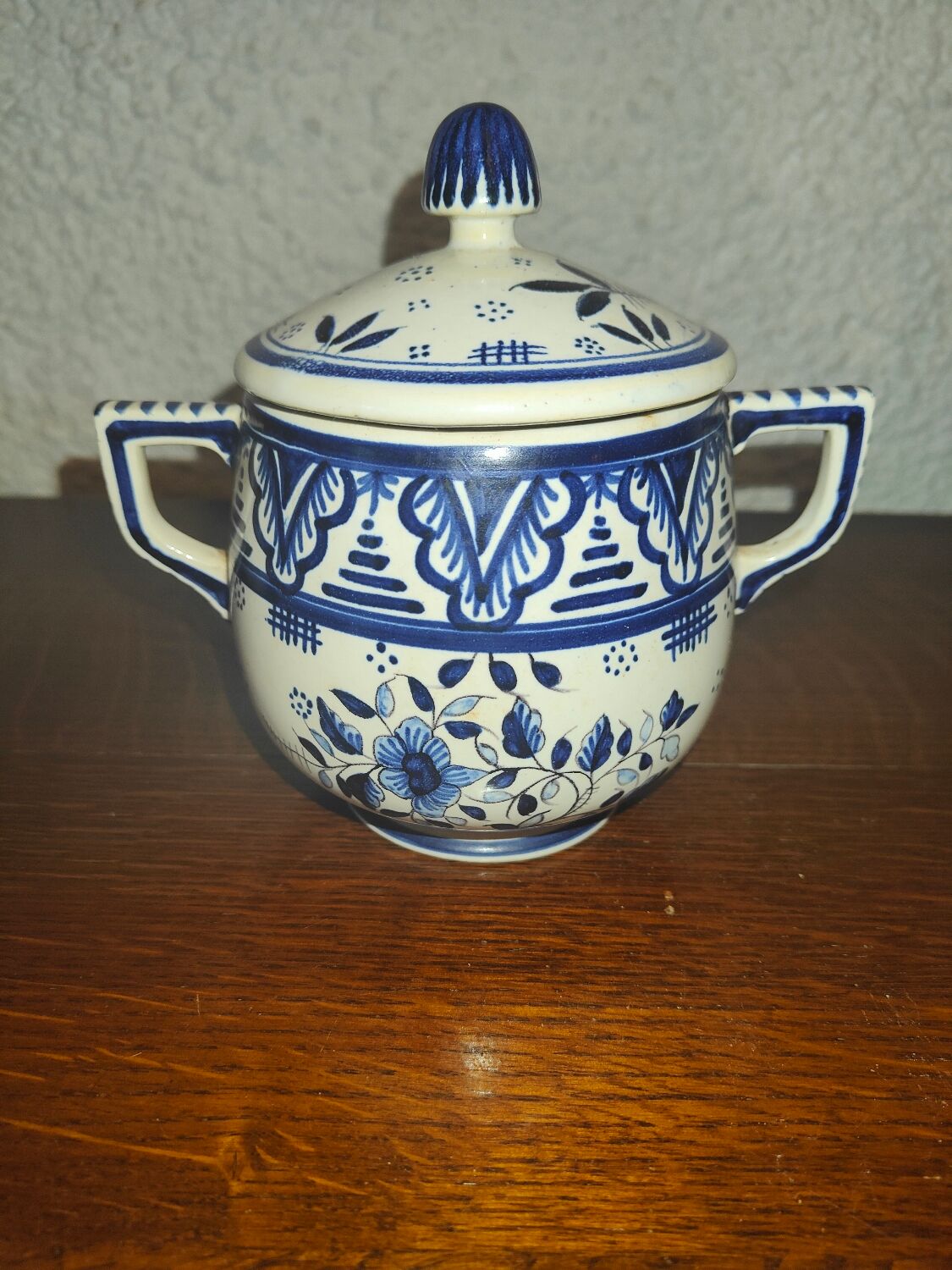 Henriot Quimper earthenware coffee set with floral decoration and elegant blue