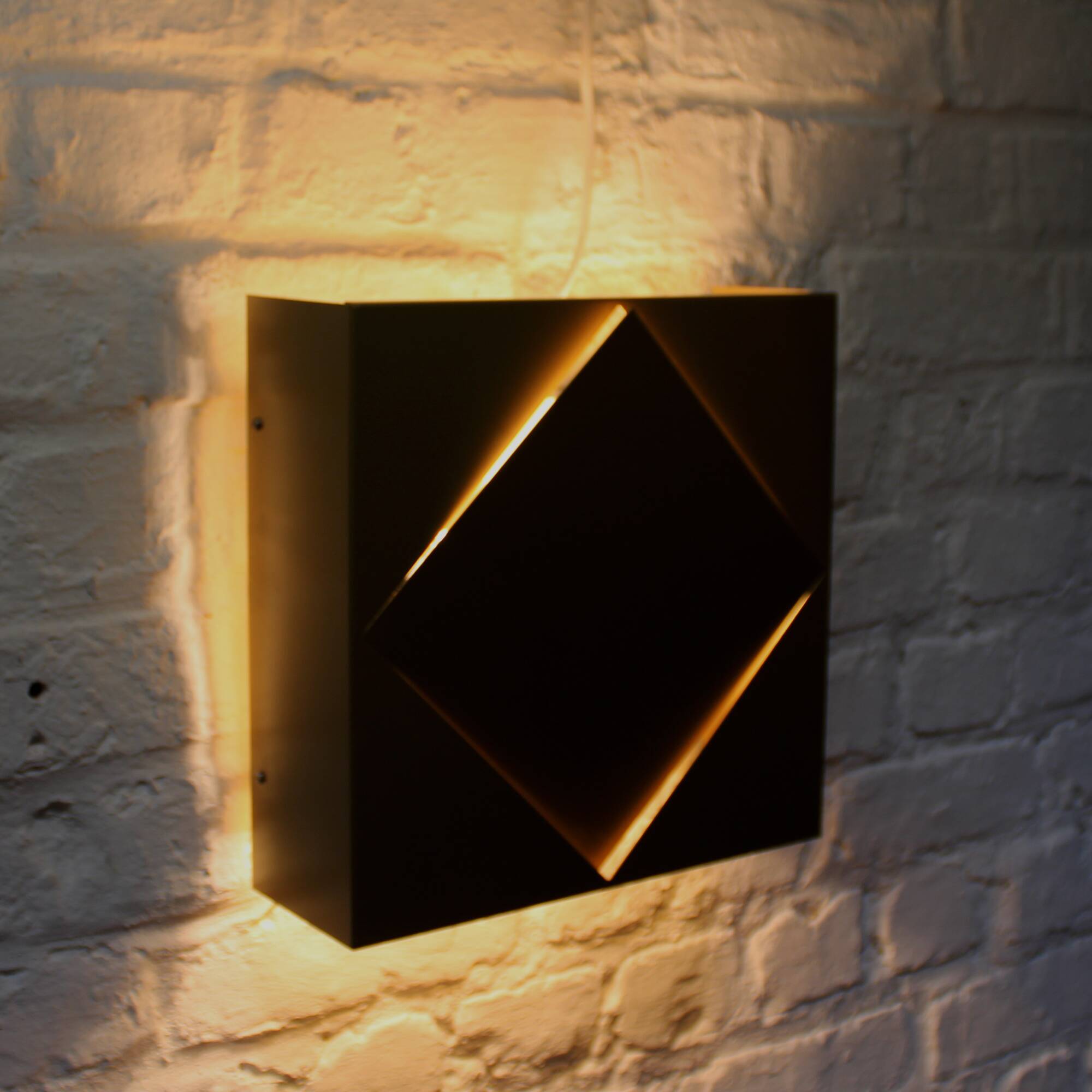 Pair of vintage Raak golden wall lights model 1556