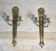 Pair of Empire style bronze wall sconces with quiver design.