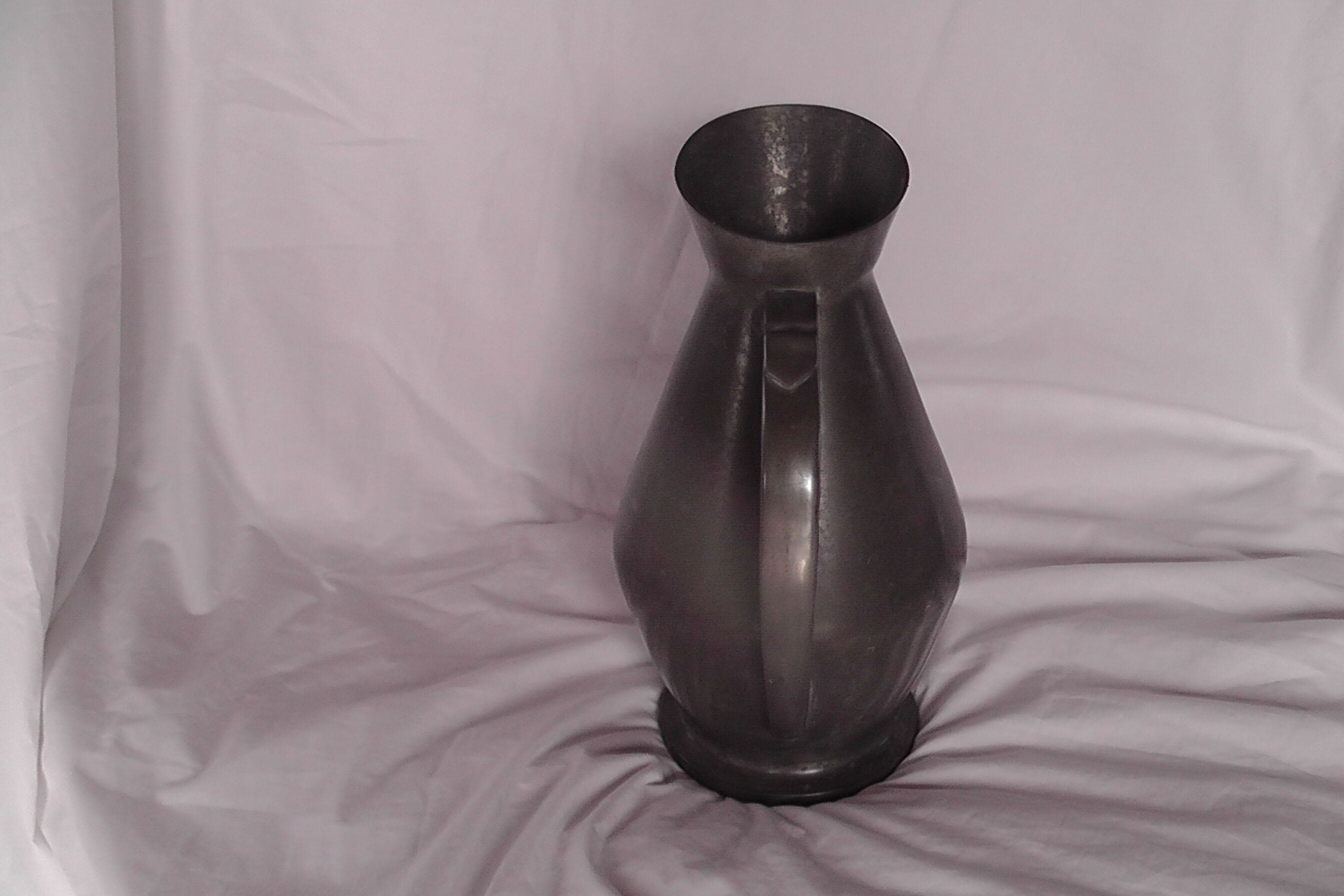 Tin pitcher vase of the manor