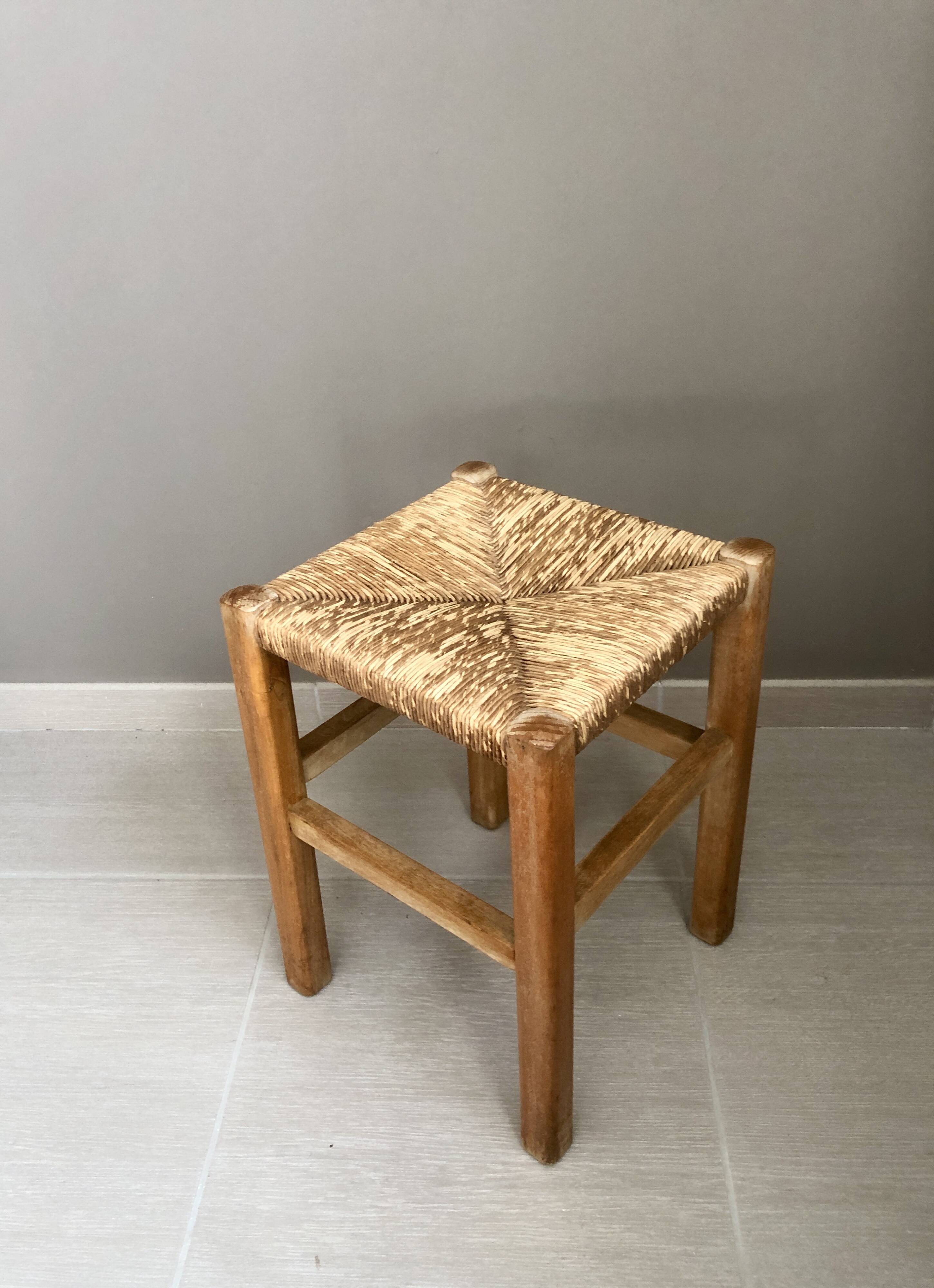 Wooden stool with straw seat