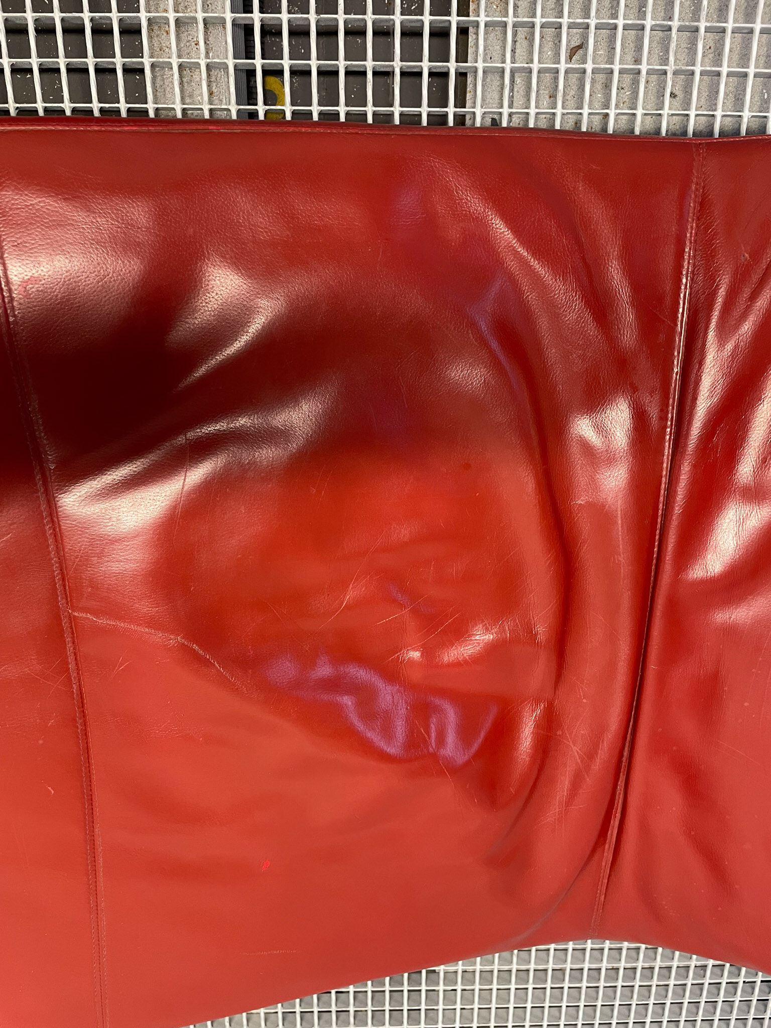 B&B Italia red leather lounge chair by Jeffrey Bernett