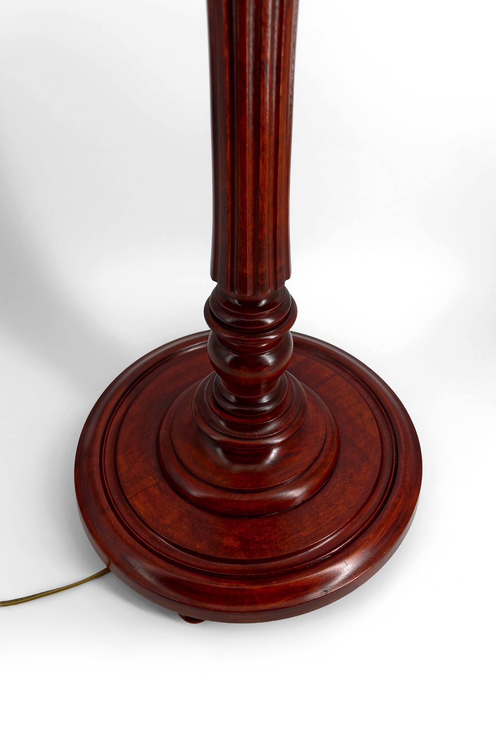 Art Deco floor lamp in carved walnut, stained glass shade, France, c. 1920