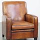 Art Deco design sheepskin leather armchair with a stunning patina