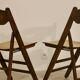 Pair of vintage folding chairs year 50 sculpted backrest.