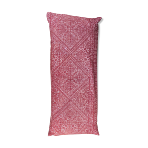 Coussin tapissé rouge et blanc