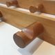 Charlotte Perriand, pair of fir wall coat racks, French work, around 1970