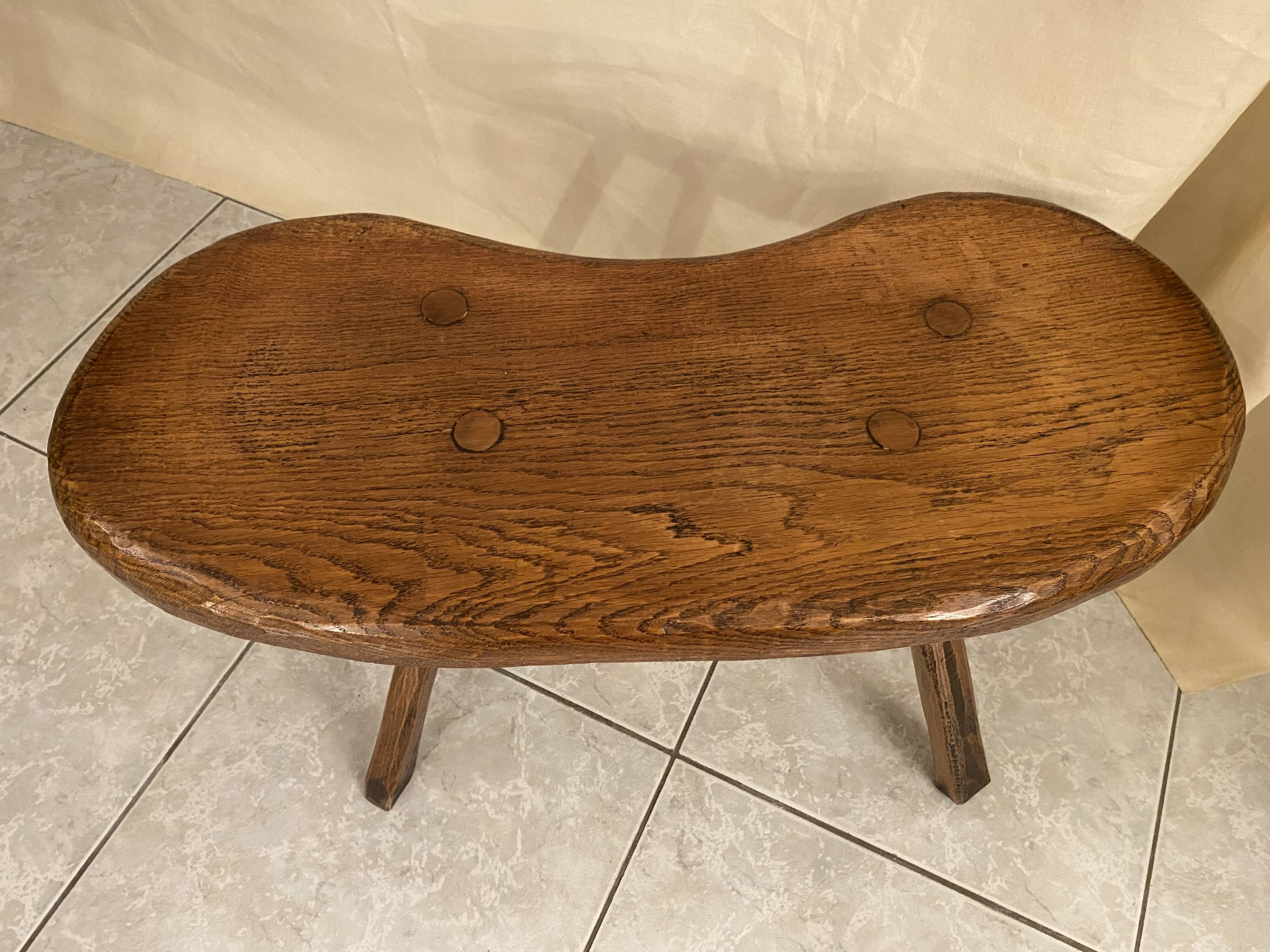 Small brutalist solid wood bench