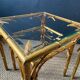 Pair of nesting tables in faux bamboo with glass tops, France, 1960s.