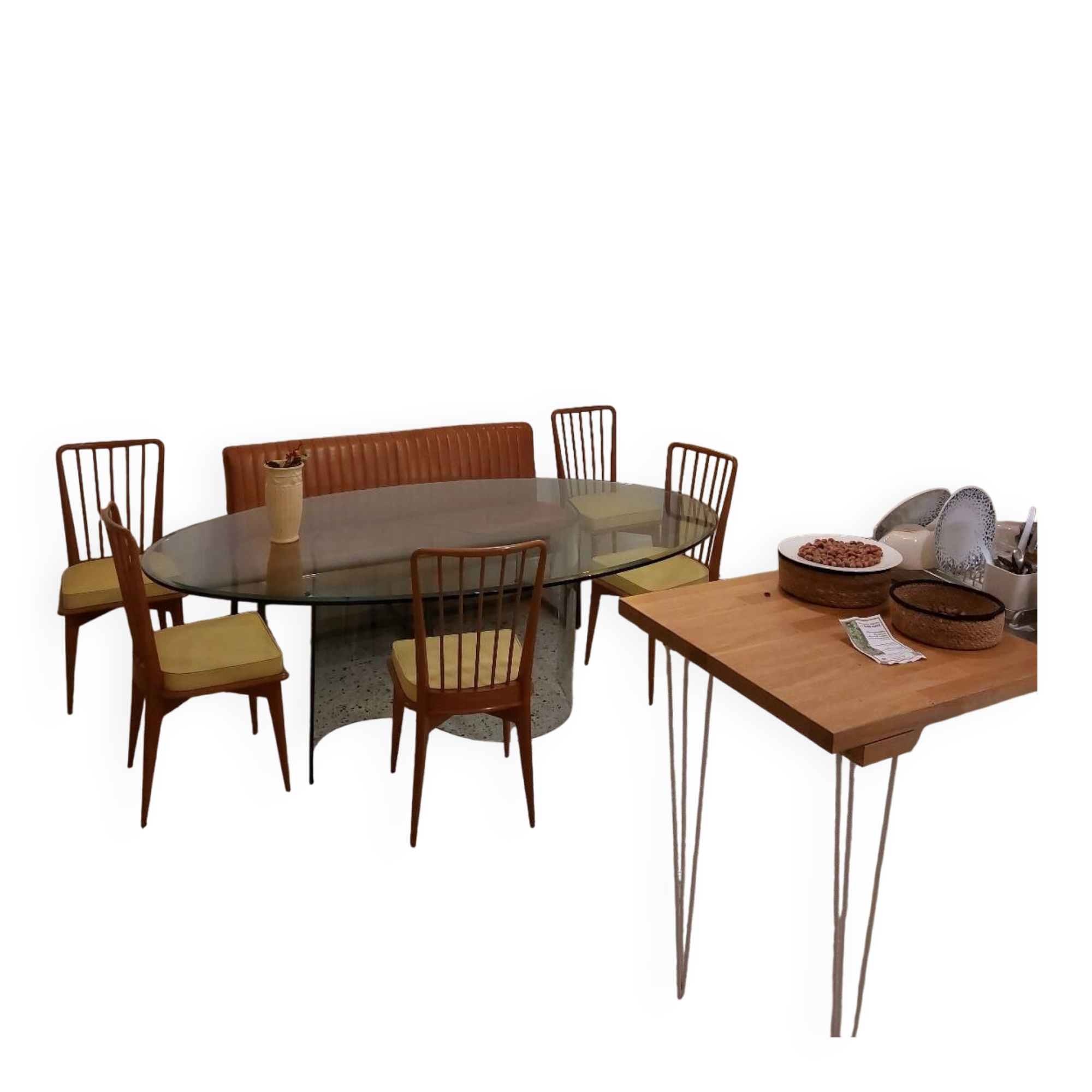 Large glass table with a curved leg.