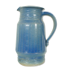 Pitcher in glazed blue sandstone signed