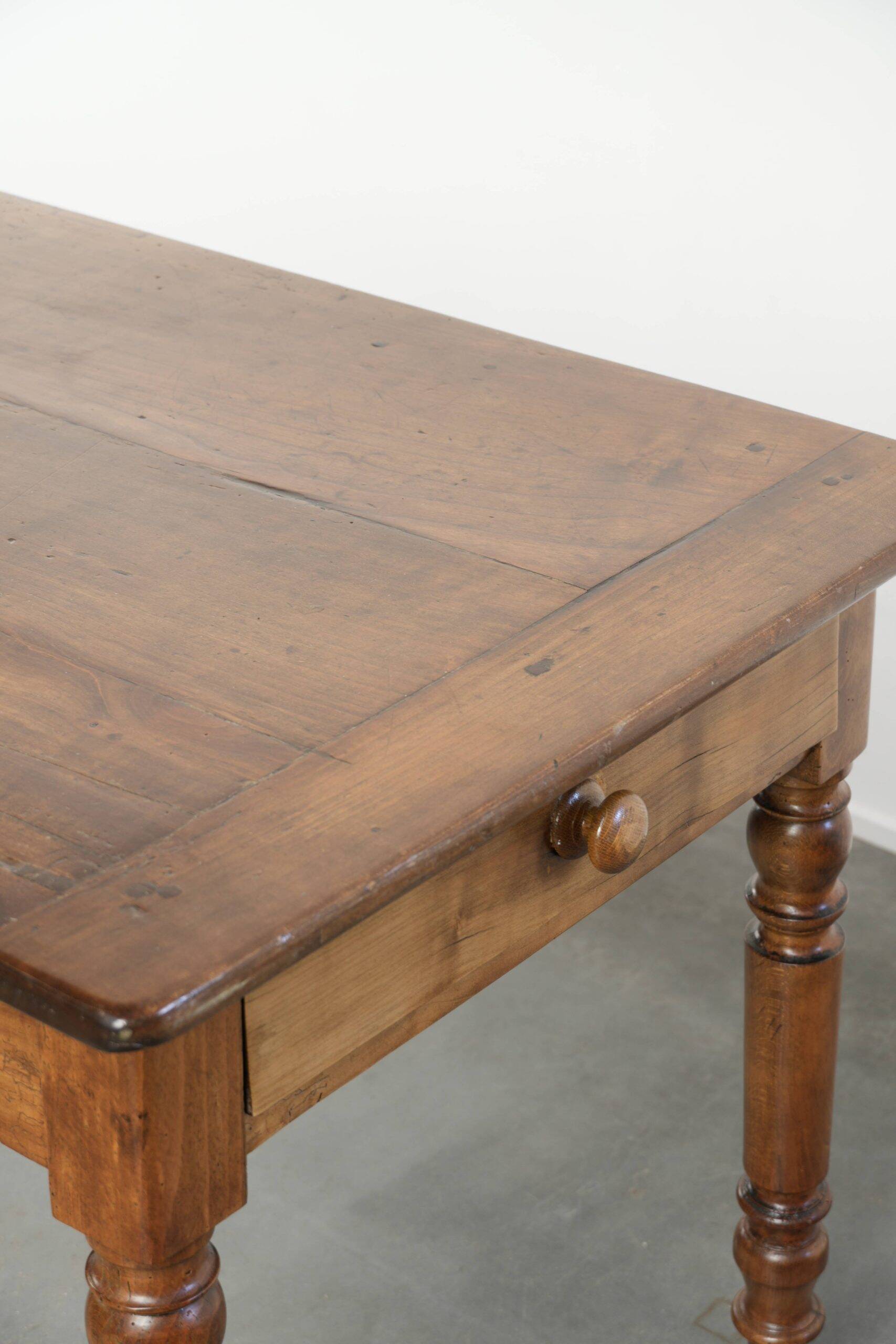 Antique French cherry wood dining table from the 19th century