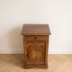 Antique bedside table in waxed wood