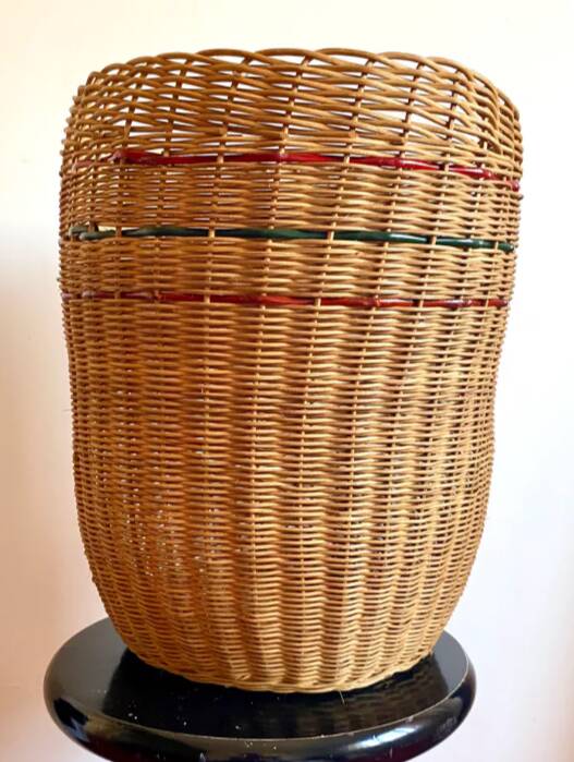High basket with woven straws