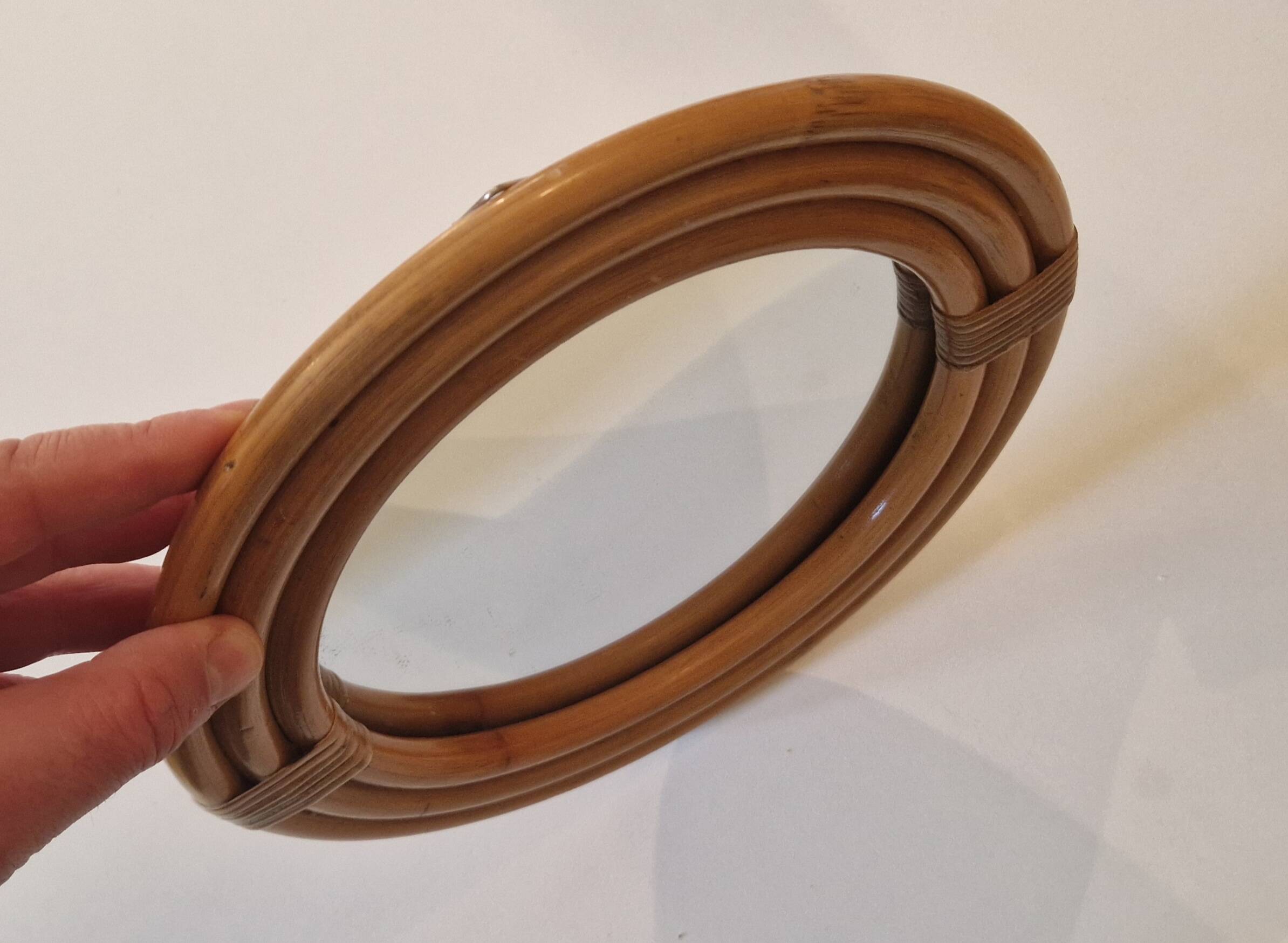 Vintage 1970s round rattan mirror