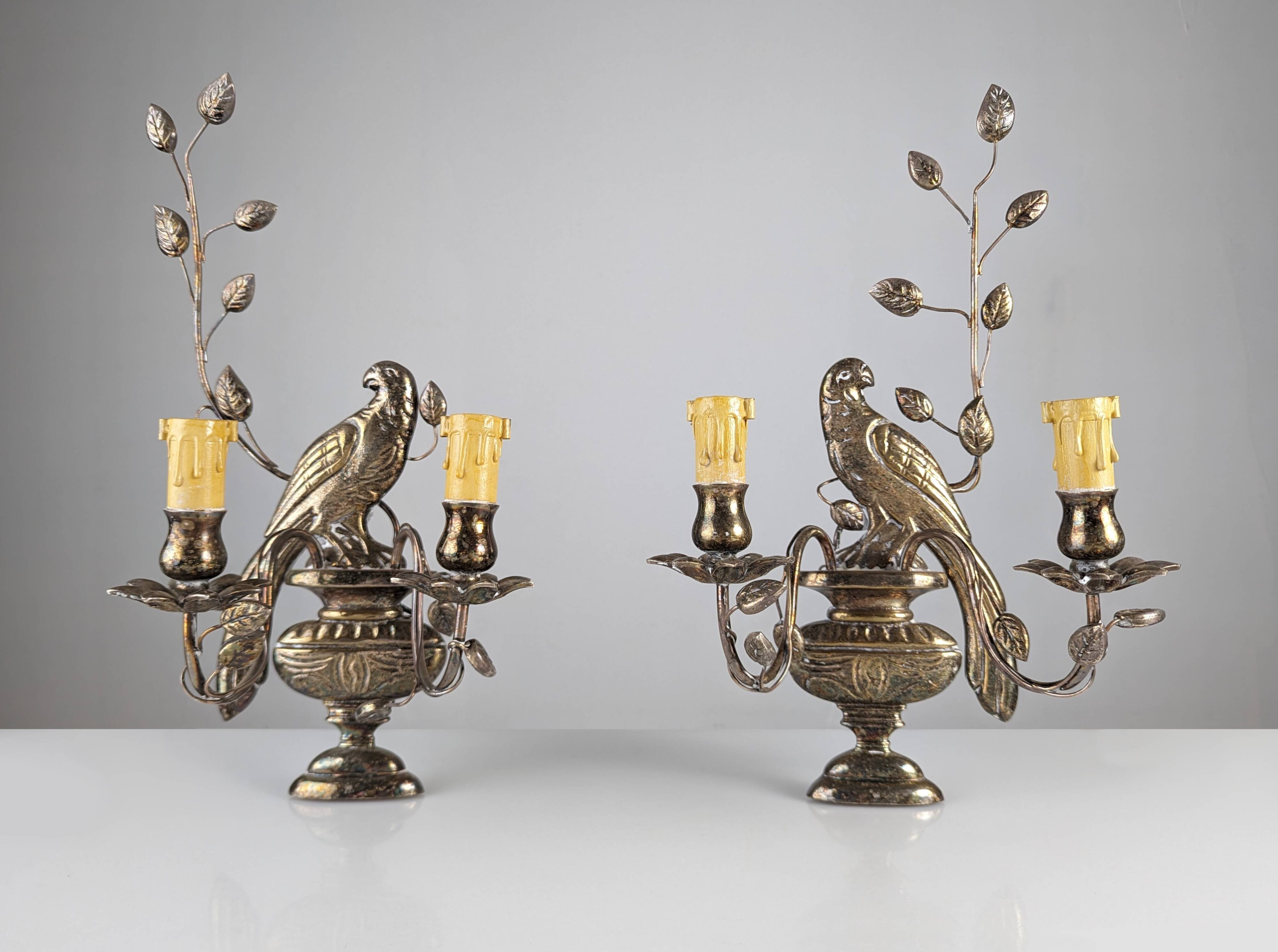 Pair of wall sconces with parrots and leaves