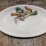 3 plates decorated with vegetables