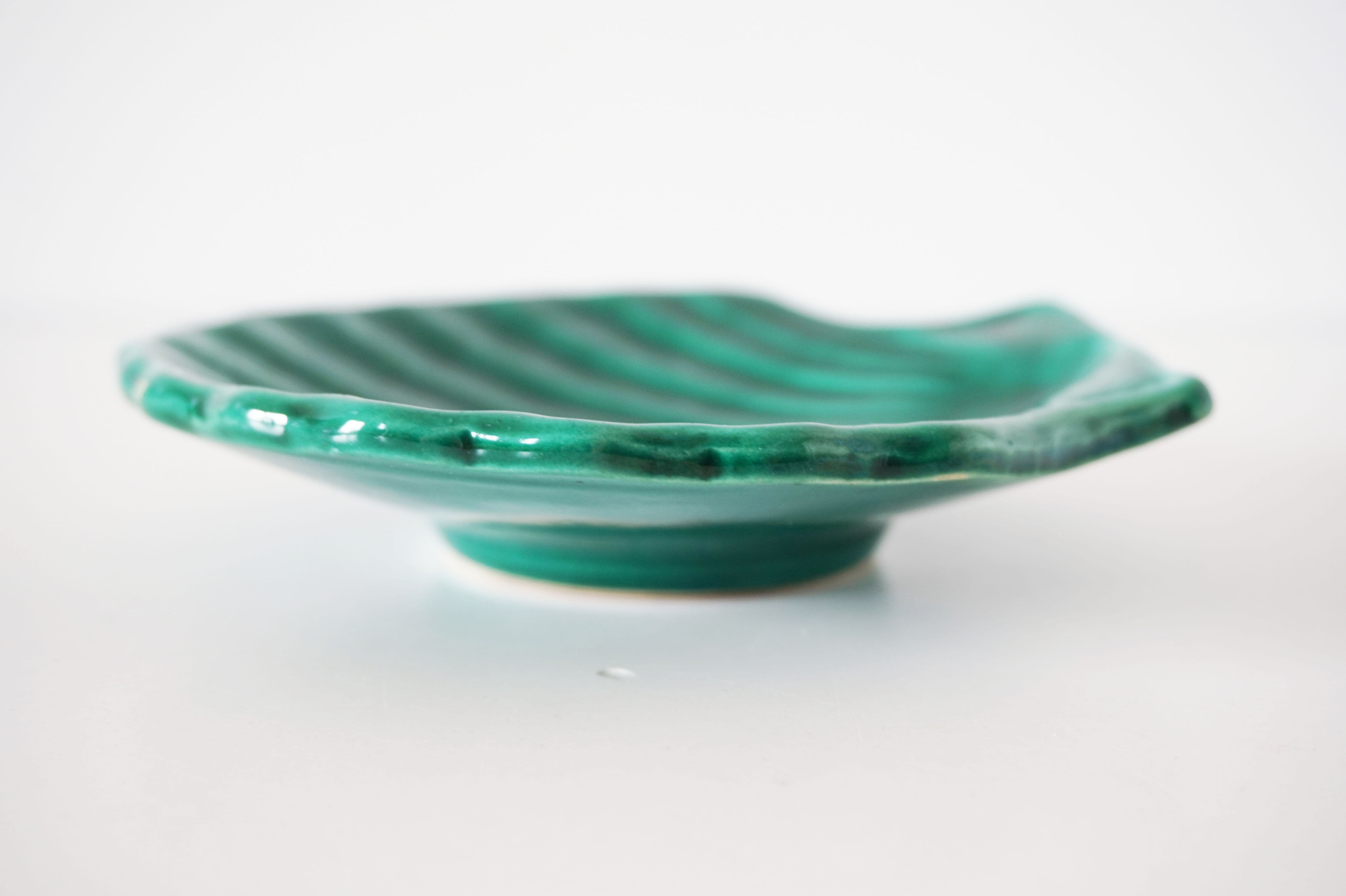Green ceramic shell cup