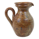 Brown speckled stoneware pitcher in very good condition