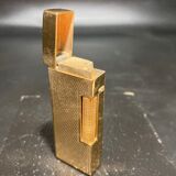 Lighter with its Win brand box