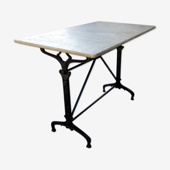 Bistro table, 1900, cast iron foot and marble top.