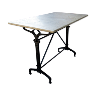 Table de bistro 1900 pied en fonte et dessus marbre.