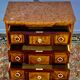 Transition style chest of drawers in rosewood and violet wood, ebony and gilded bronzes