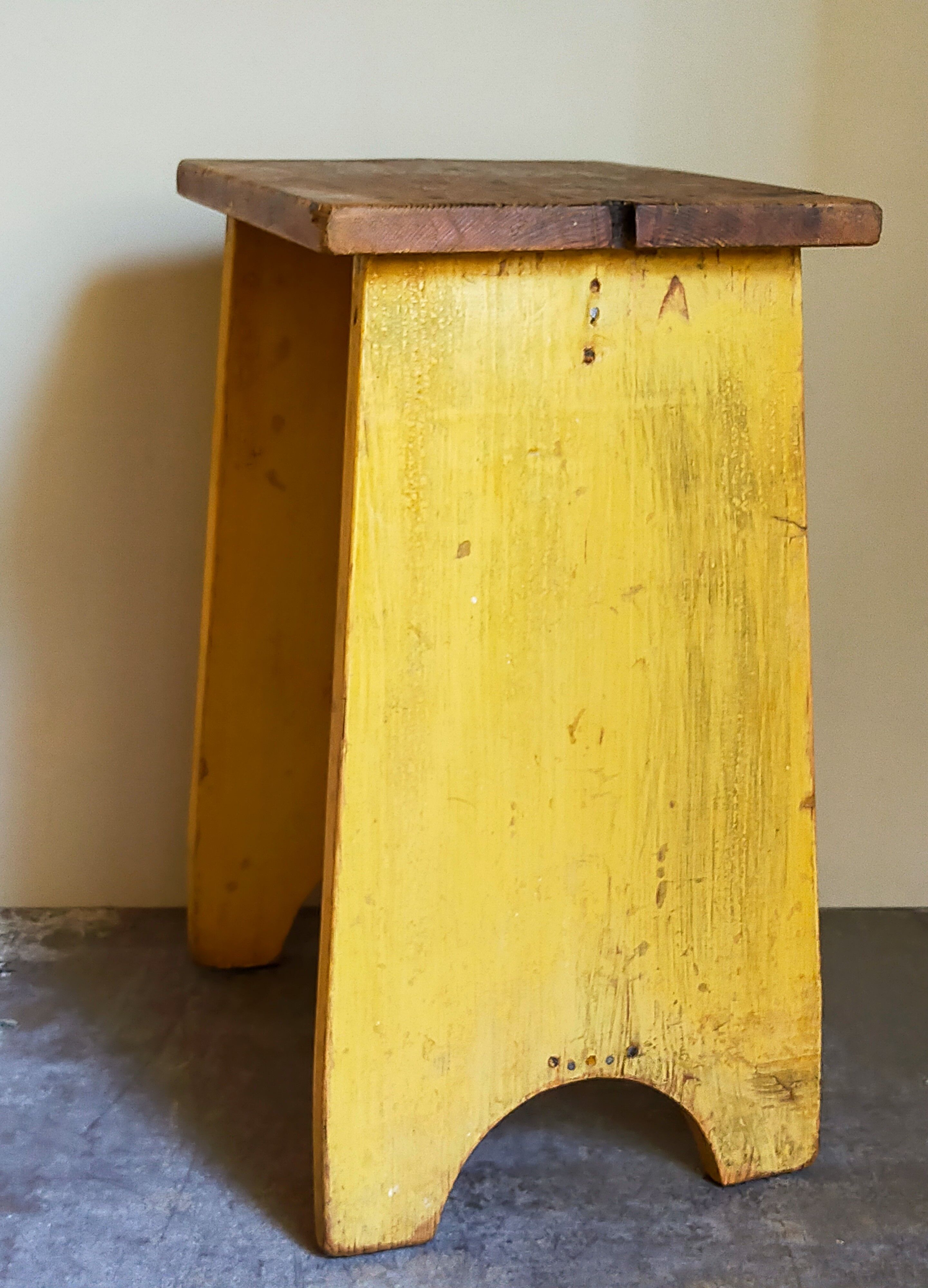 Art-populaire workshop stool in patinated painted wood