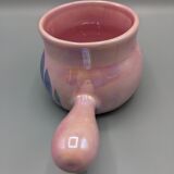 Iridescent pink frying pan, blue flower decoration