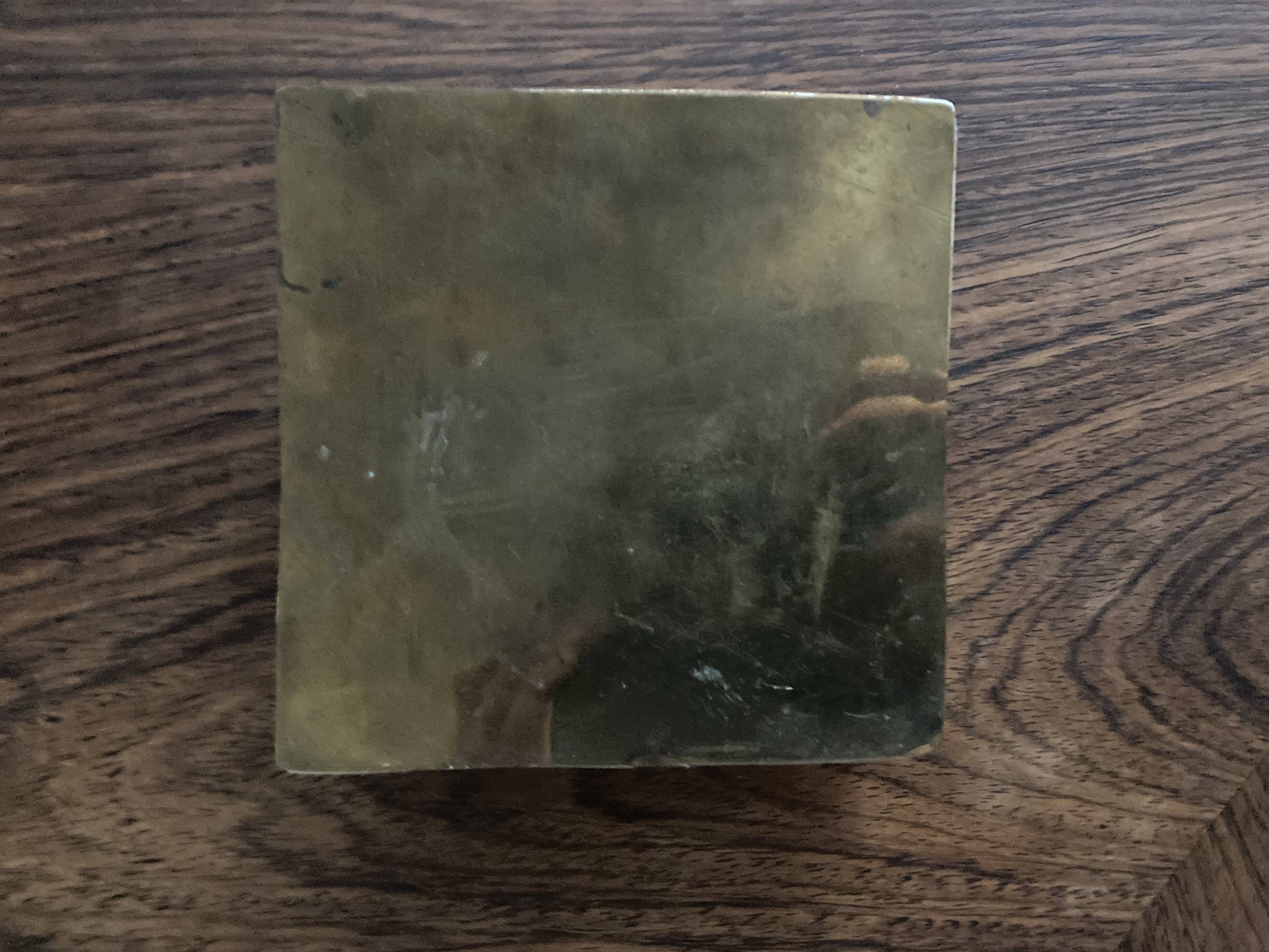 Bone and brass ashtray