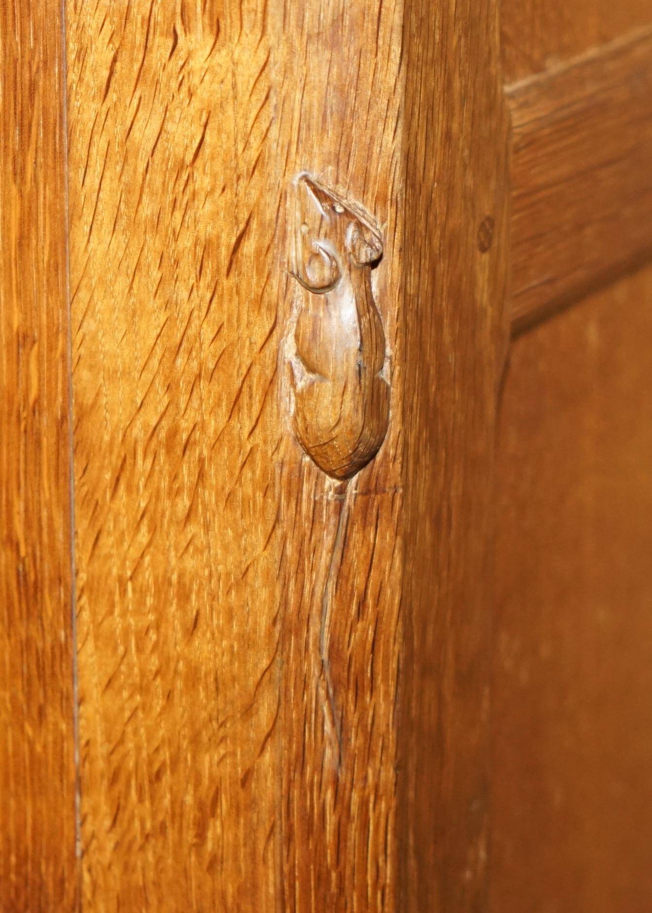 Vintage Robert Mouseman Thompson oak display cabinet with shelves and lighting.
