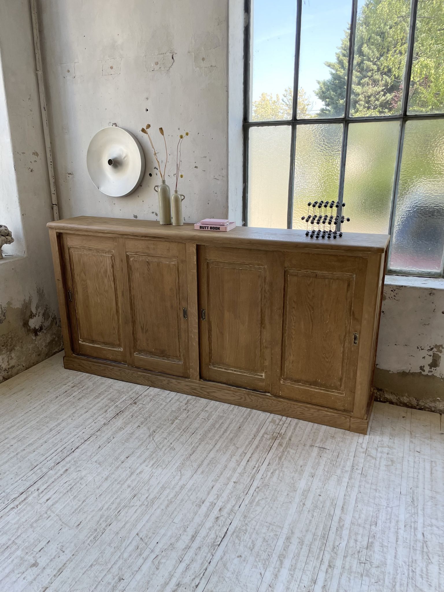 Large row of solid oak loom sliding doors