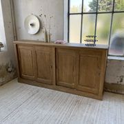 Large row of solid oak loom sliding doors