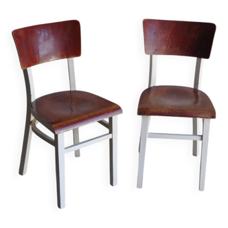 Set of dining chairs in painted white pine with brown wooden seats, 1950s.