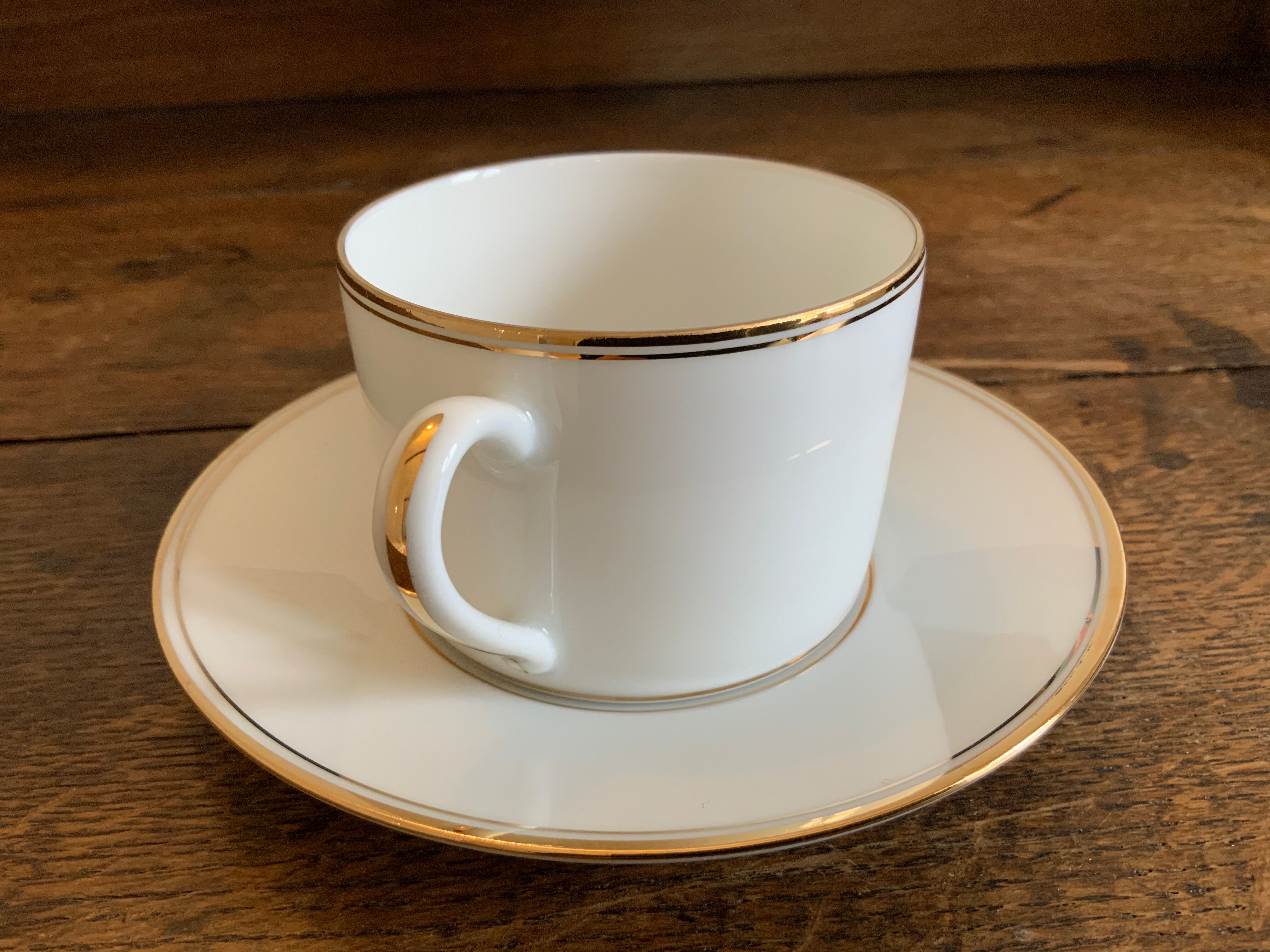 Duo of tea cups gold border Bernardaud Limoges