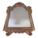 Antique mirror in gilded wood.