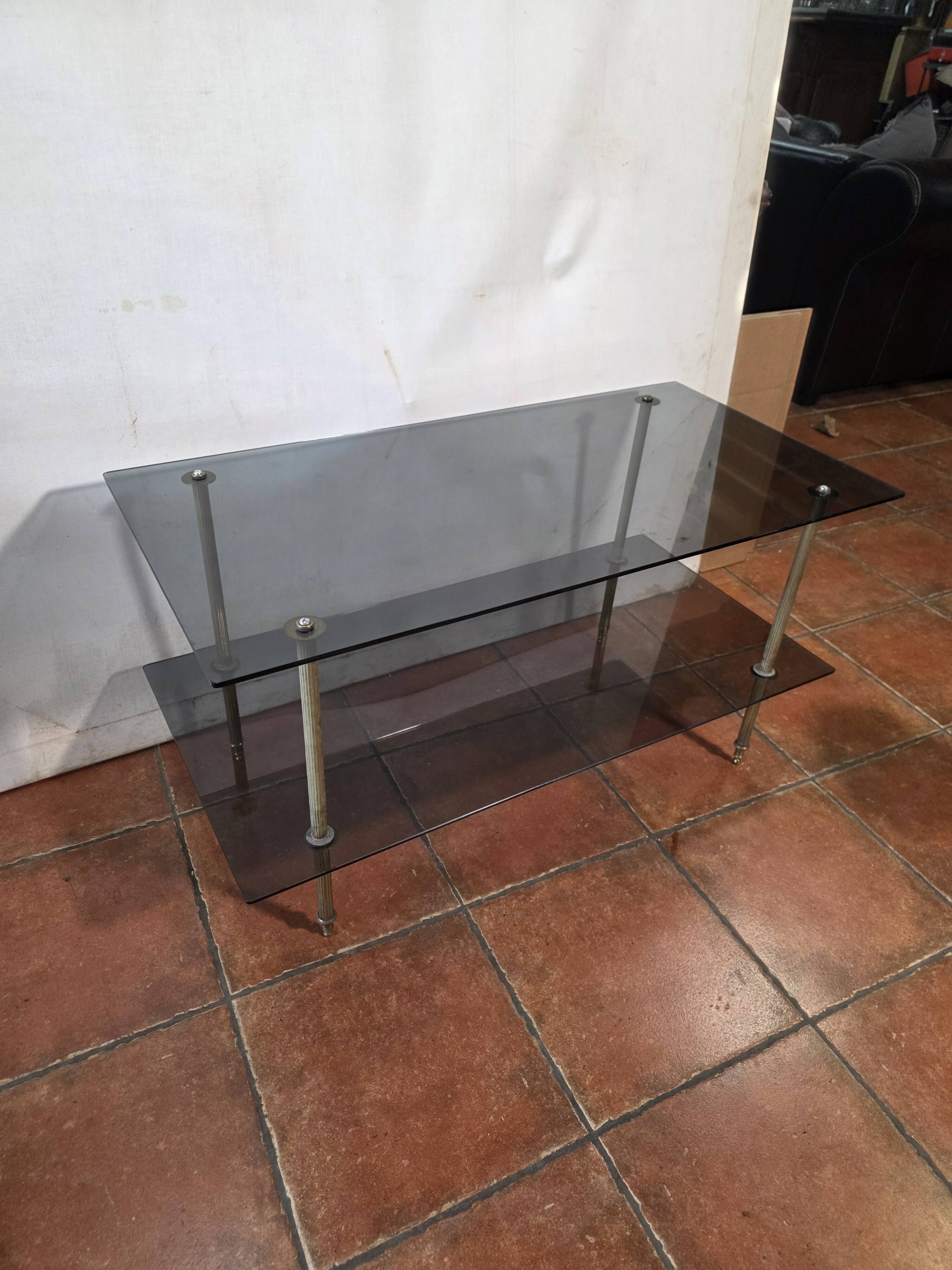 Smoked glass and brass coffee table from the 1970s.