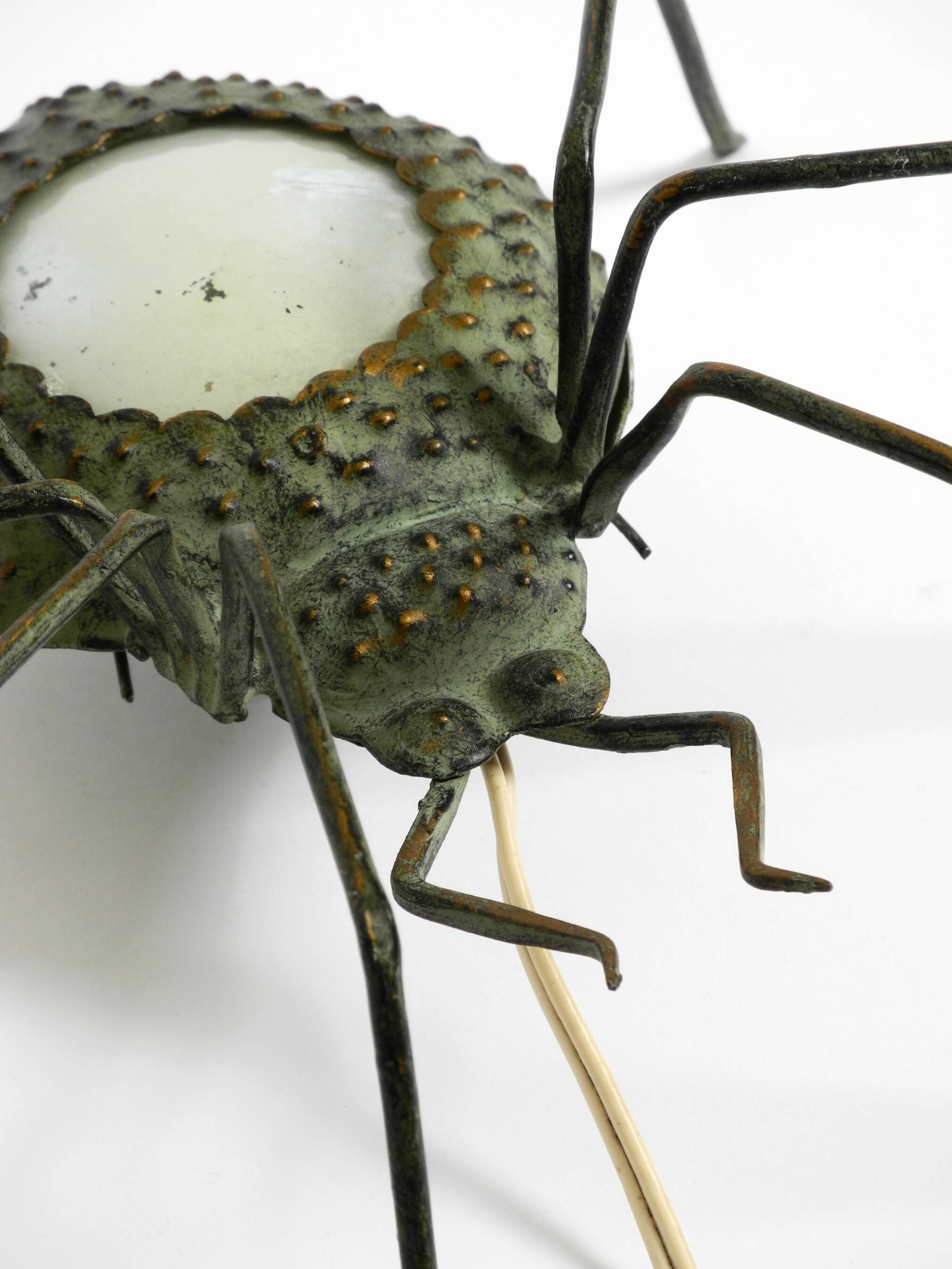 Beautiful Italian Mid Century Modern "Spider" wall lamp made of metal