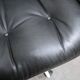 Black leather armchair by Charles Pollock for Knoll International