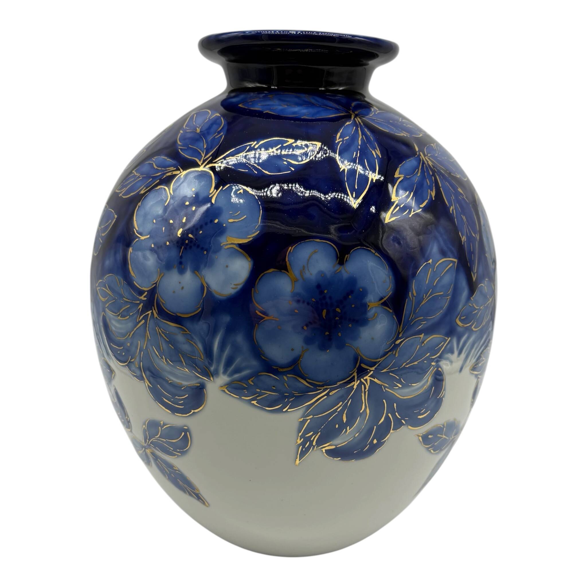 Large Tharaud Limoges vase in cobalt blue porcelain with floral decoration.