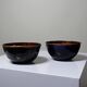 Pair of vintage hand-crafted blue and copper enamelled bowls.