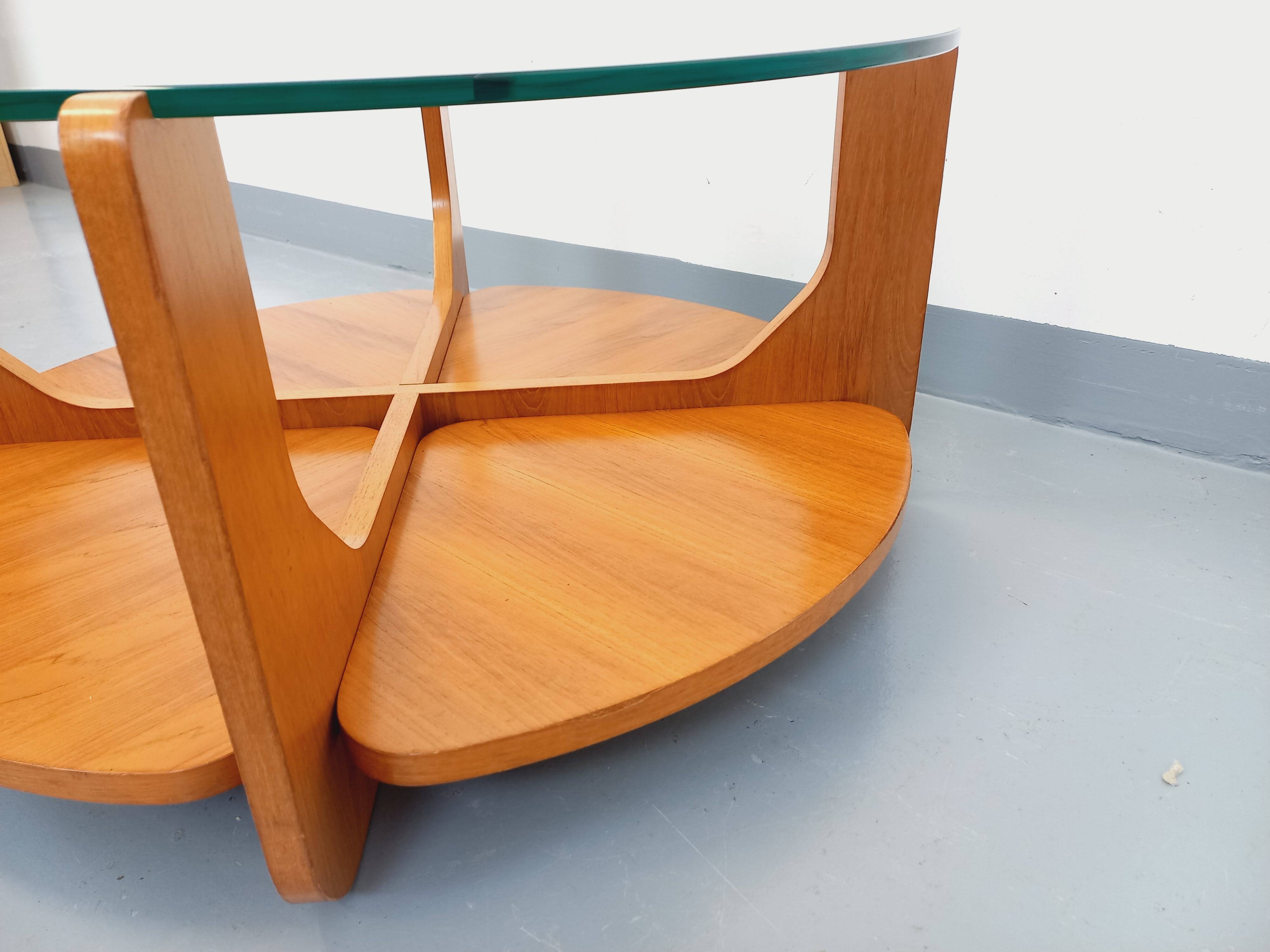 Vintage round coffee table with 2 tops by Hugues Poignant, in teak and glass