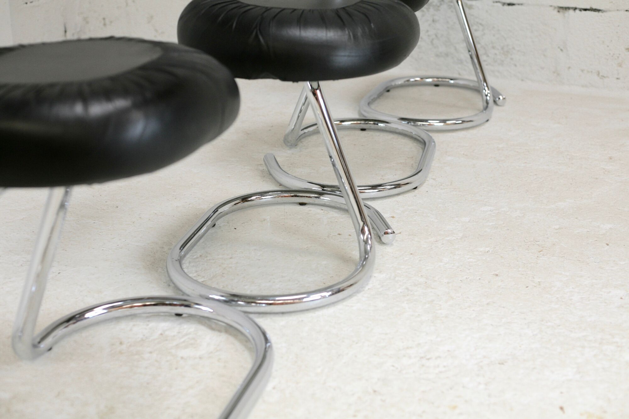 4 chairs tubular steel, imitation black leather, Italy, circa 1970