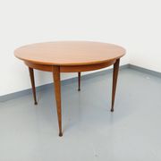 Round dining table in vintage Scandinavian style from the 50s and 60s in teak.