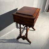 Antique wooden sewing table with drawer.
