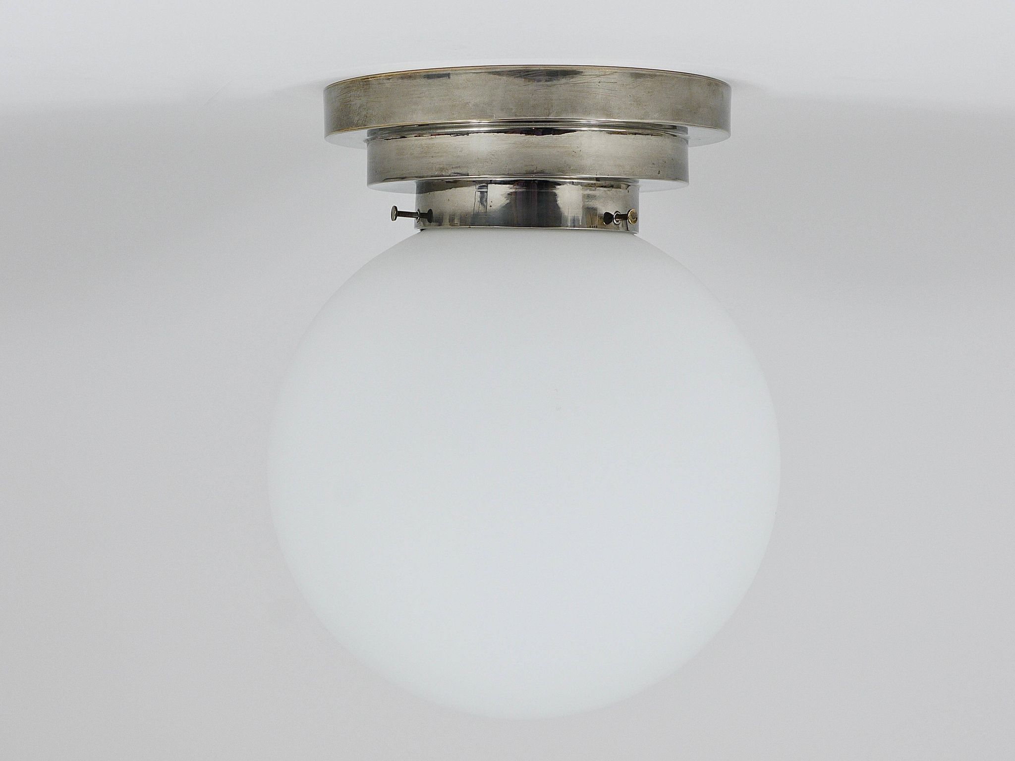 Large opaline glass globe ceiling lamp in Art Deco style.